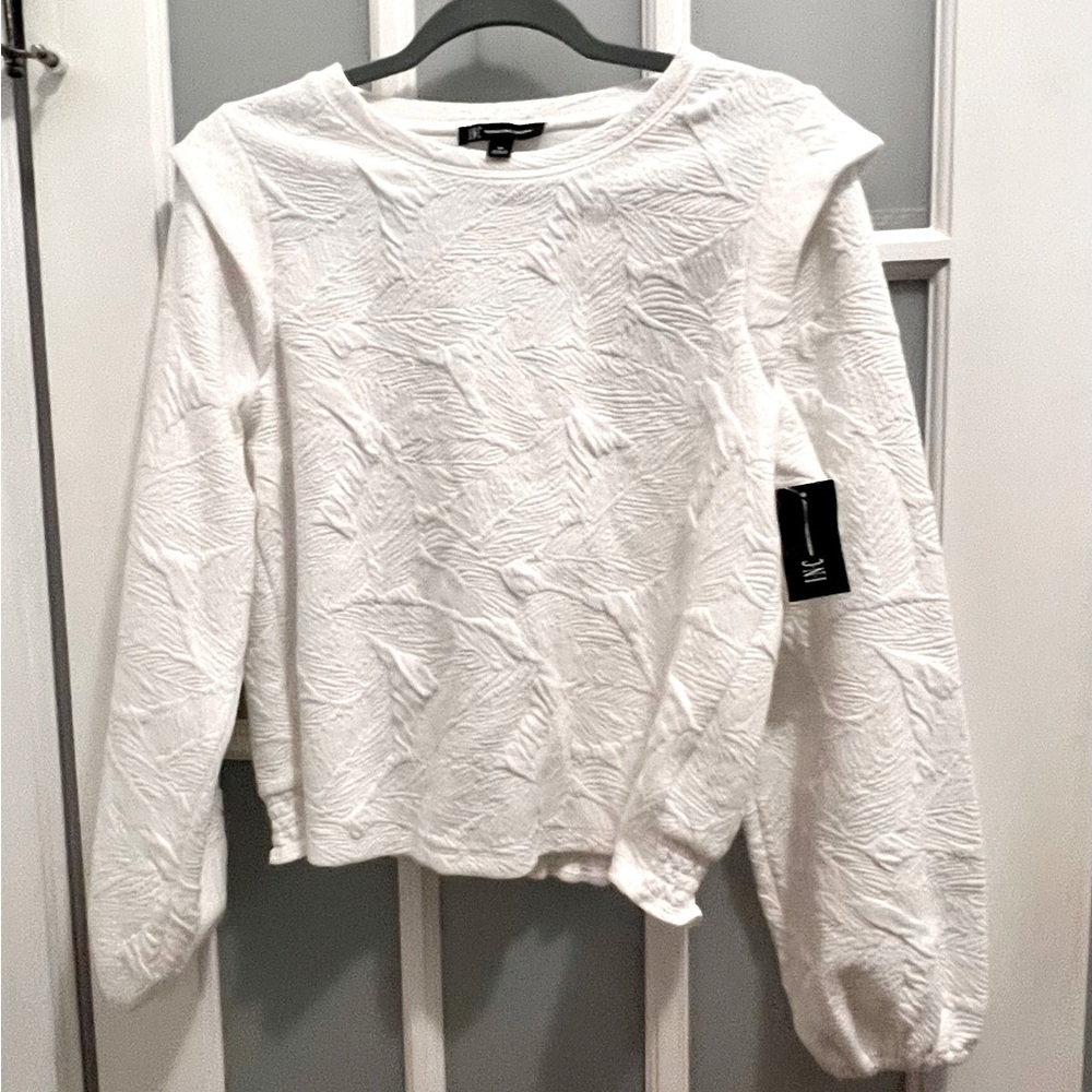 White, long sleeve INC top. Textured, washed white shirt for casual or dressy.